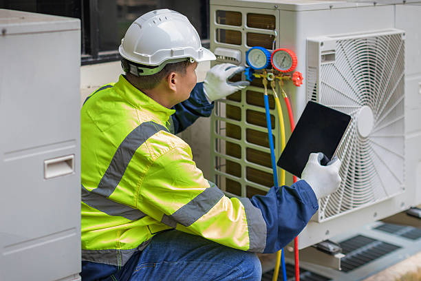 Professional Air Duct Cleaning technician working in Wilmington, OH